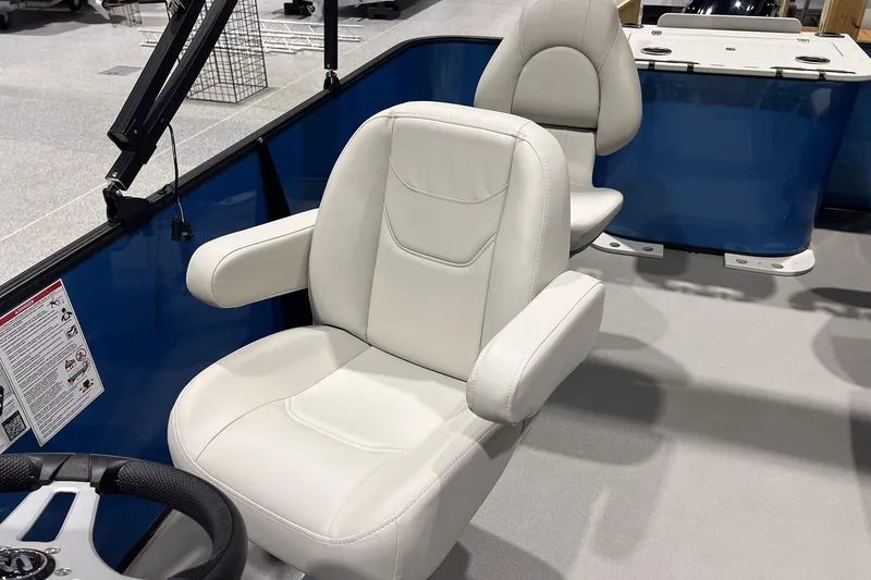 Slide: The Image of 2026 Sylvan Mirage Fish 820 Party Fish boat with comfortable white seating. - 9