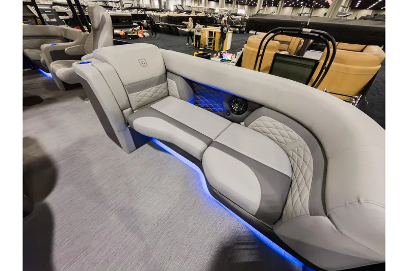 Slide: The Image of Luxurious seating on 2026 Godfrey Monaco 235 Sun Deck boat with ambient lighting. - 10