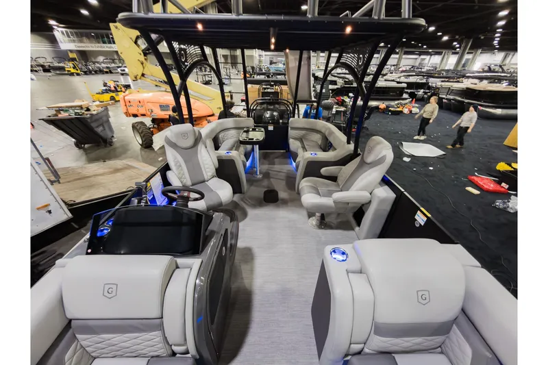 Slide: The Image of 2026 Godfrey Monaco 235 Sun Deck boat interior with luxurious seating and modern design. - 11