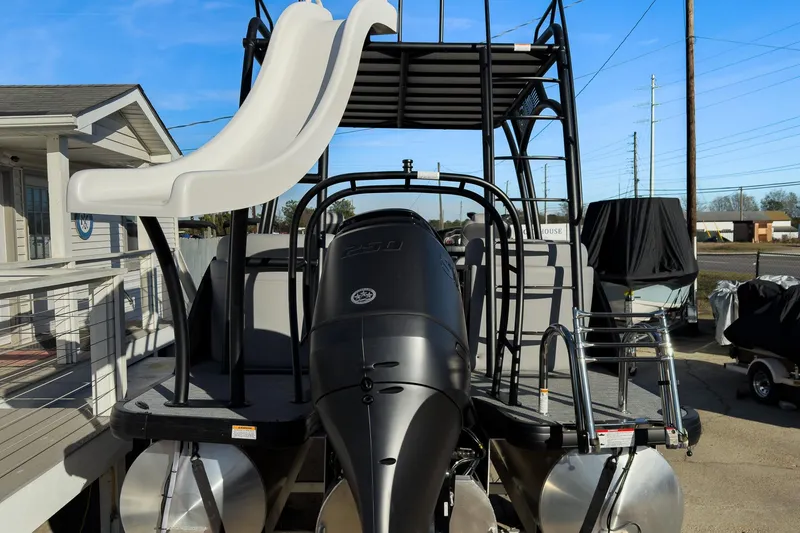 Slide: The Image of 2026 Godfrey Monaco 235 Sun Deck boat with slide and powerful engine. - 29