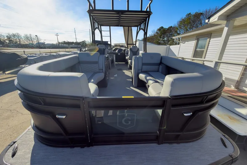 Slide: The Image of 2026 Godfrey Monaco 235 Sun Deck boat with spacious seating and modern design. - 33