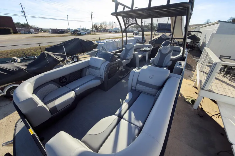 Slide: The Image of 2026 Godfrey Monaco 235 Sun Deck boat with luxurious seating and modern design. - 35