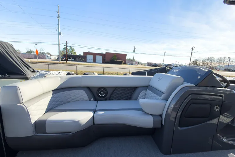 Slide: The Image of Luxurious seating on 2026 Godfrey Monaco 235 Sun Deck boat, featuring modern design and comfort. - 39