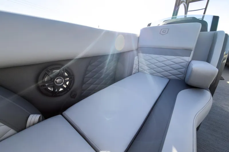 Slide: The Image of Luxurious seating on 2026 Godfrey Monaco 235 Sun Deck boat with premium speaker system. - 40