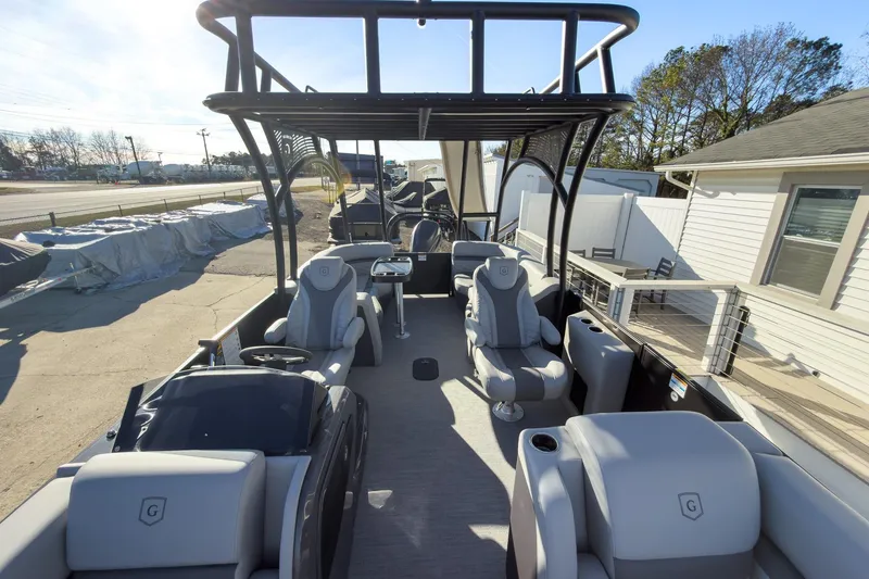 Slide: The Image of 2026 Godfrey Monaco 235 Sun Deck boat with luxurious seating and modern design. - 43