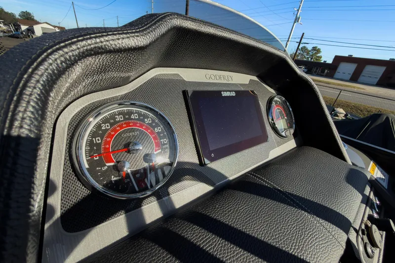 Slide: The Image of Dashboard of 2026 Godfrey Monaco 235 Sun Deck boat with speedometer and display. - 51