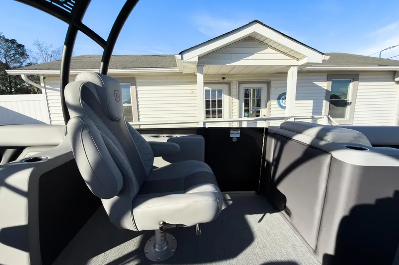 Slide: The Image of 2026 Godfrey Monaco 235 Sun Deck boat interior with luxurious seating and modern design. - 54