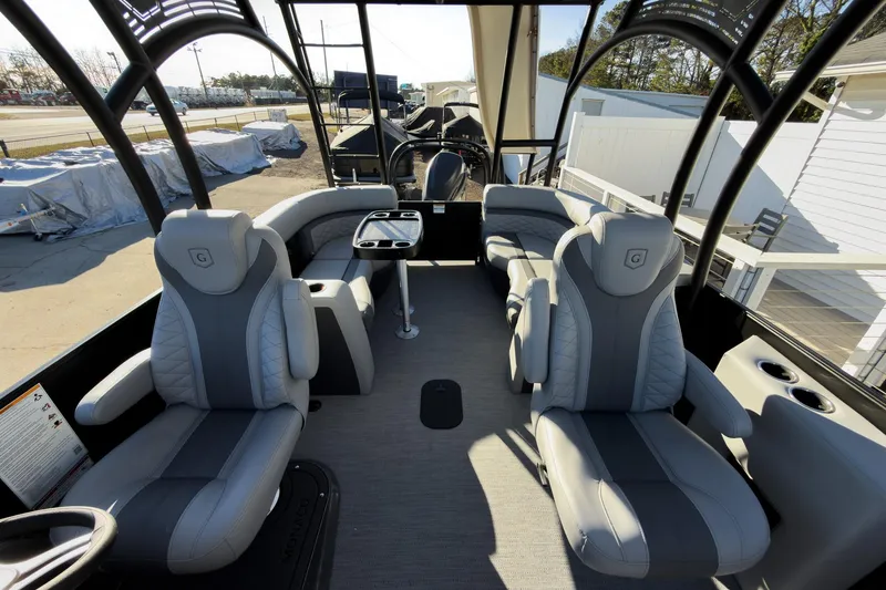 Slide: The Image of Luxurious interior of 2026 Godfrey Monaco 235 Sun Deck boat with plush seating and modern design. - 55