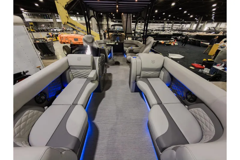 Slide: The Image of Luxurious interior of 2026 Godfrey Monaco 235 Sun Deck boat with elegant seating and ambient lighting. - 6