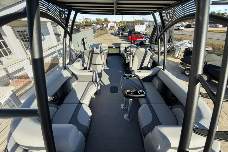 Slide: The Image of 2026 Godfrey Monaco 235 Sun Deck boat interior with seating and table. - 62