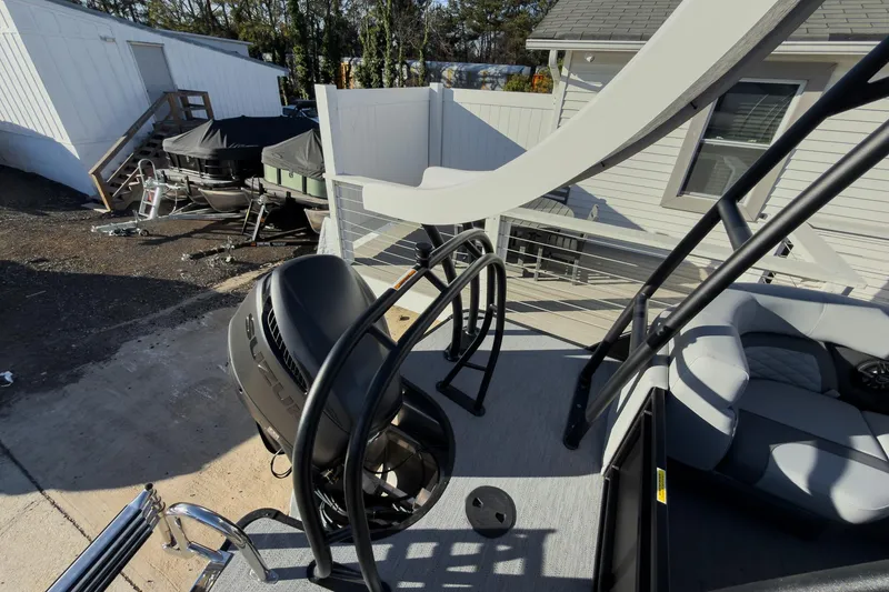 Slide: The Image of 2026 Godfrey Monaco 235 Sun Deck boat with slide and Suzuki engine. - 63