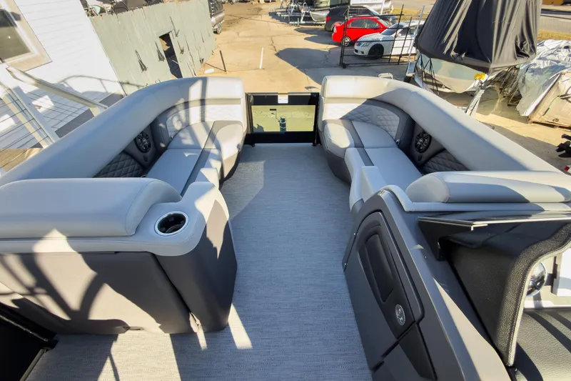 Slide: The Image of 2026 Godfrey Monaco 235 Sun Deck interior with luxurious seating and modern design. - 79