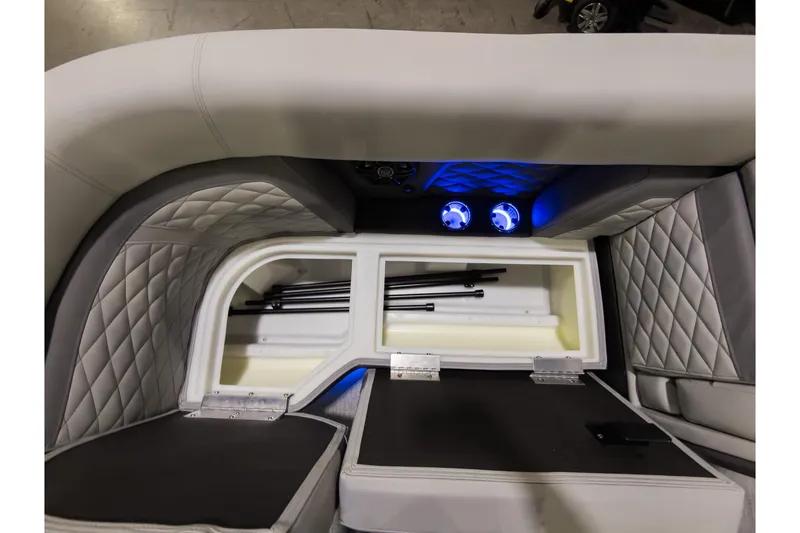 Slide: The Image of Interior storage compartment of 2026 Godfrey Monaco 235 Sun Deck boat with quilted upholstery. - 9