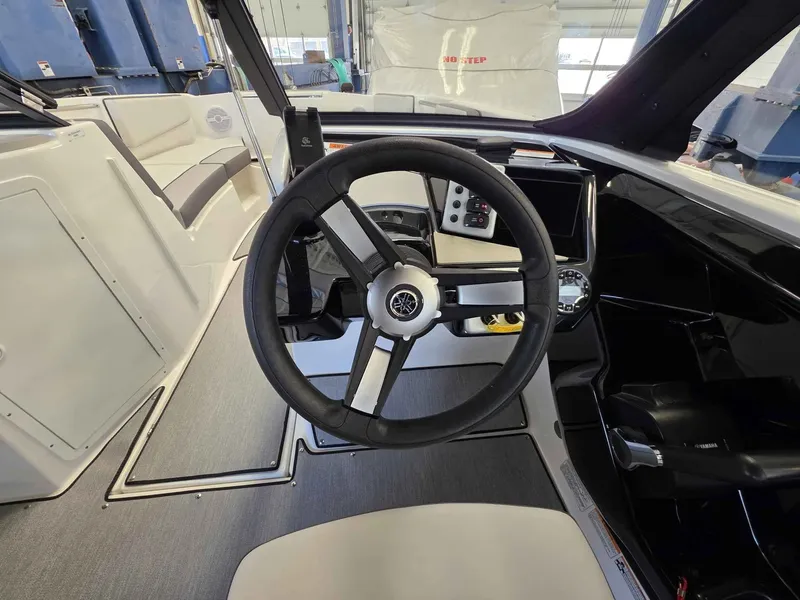 Slide: The Image of Interior view of 2026 Yamaha AR220 boat cockpit. - 16
