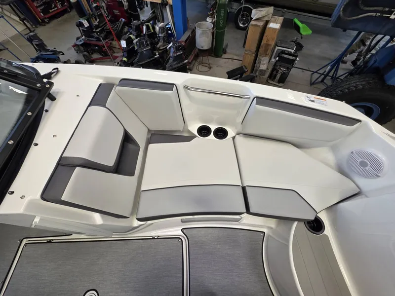 Slide: The Image of Interior of 2026 Yamaha AR220 boat with gray upholstery. - 18