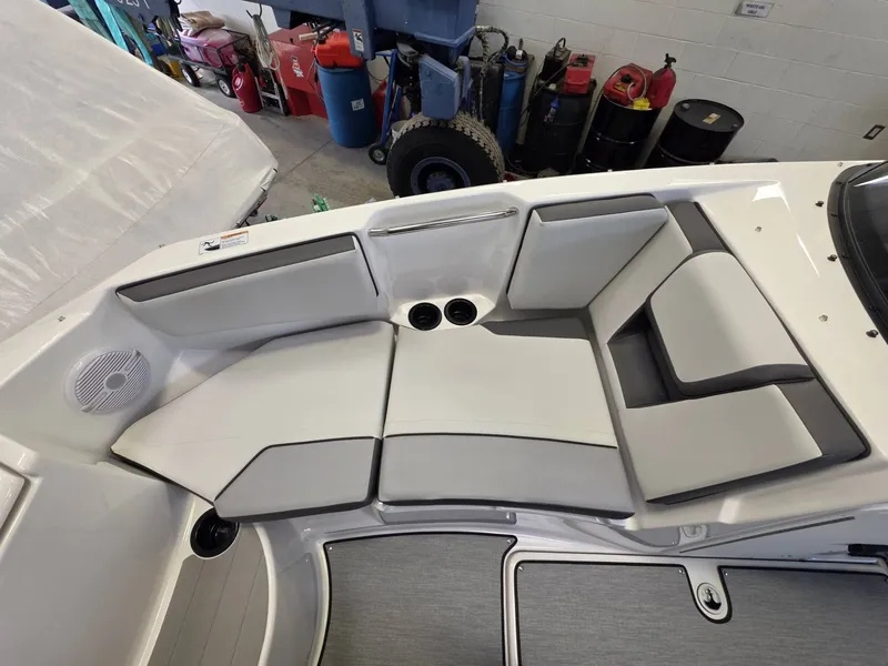 Slide: The Image of Interior of 2026 Yamaha AR220 boat with gray upholstery. - 23