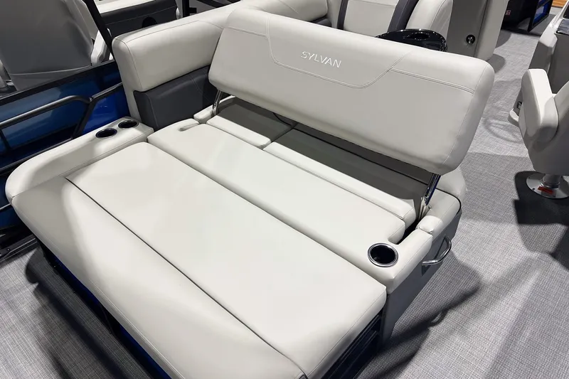 Slide: The Image of 2026 Sylvan Mirage 822 CLZ boat seating with cup holders, showcasing luxury and comfort. - 17