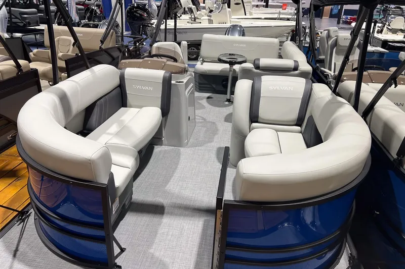Slide: The Image of 2026 Sylvan Mirage 822 CLZ pontoon boat with luxurious seating and modern design. - 5