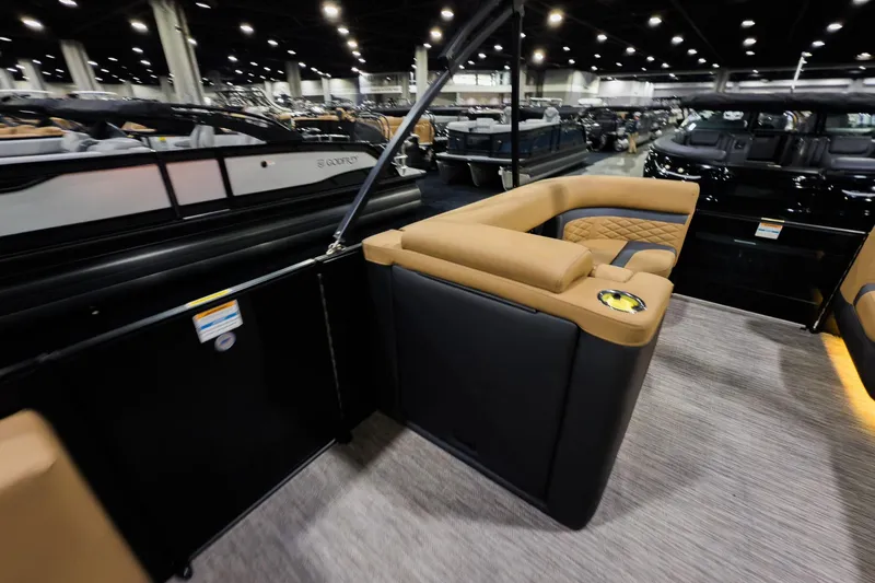 Slide: The Image of Luxurious interior of 2026 Godfrey Monaco 255 Sun Deck boat at a showroom. - 21
