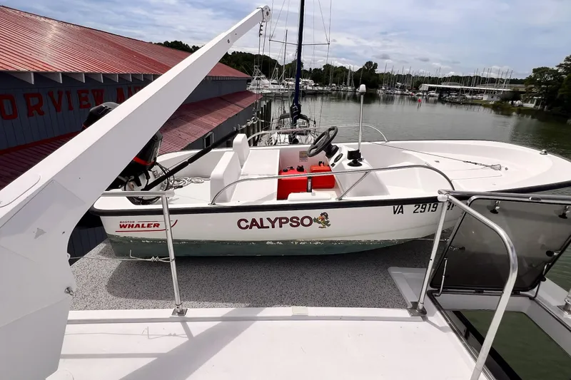 Slide: The Image of 1985 Hartman-Palmer 60 Flush Deck Motor Yacht with Boston Whaler Calypso on deck. - 14