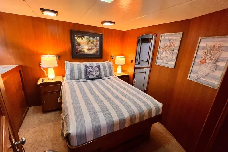 Slide: The Image of Cozy bedroom in 1985 Hartman-Palmer 60 Flush Deck Motor Yacht with nautical decor. - 36