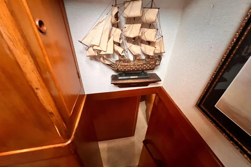 Slide: The Image of Wooden ship model decor on 1985 Hartman-Palmer yacht interior wall. - 49
