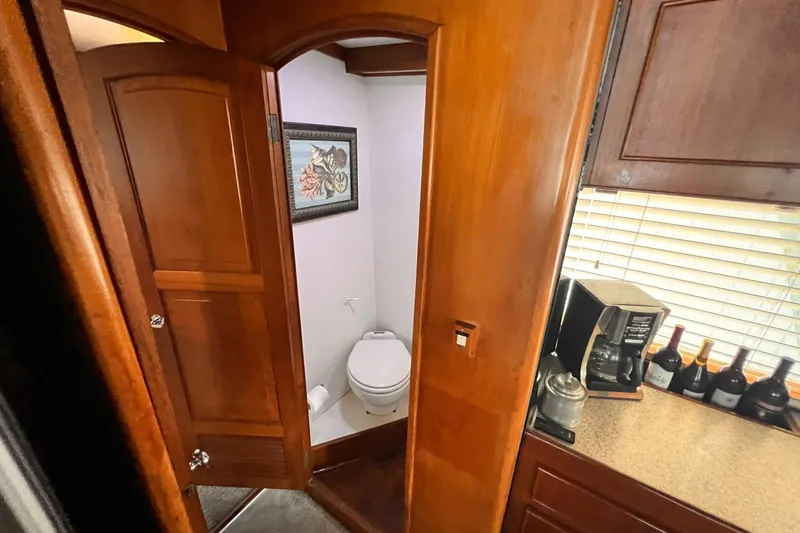 Slide: The Image of Interior of 1985 Hartman-Palmer yacht with bathroom and kitchen area. - 53