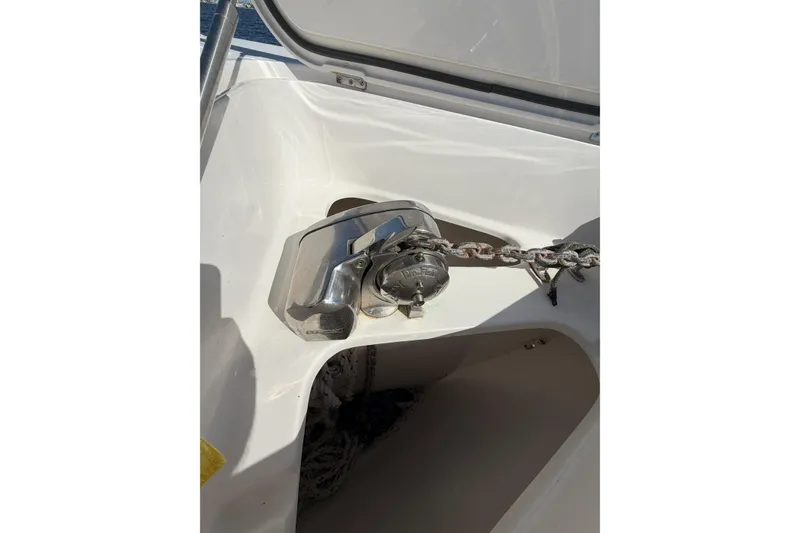 Slide: The Image of Anchor chain mechanism on a 2018 Jupiter 38 FS boat deck. - 10