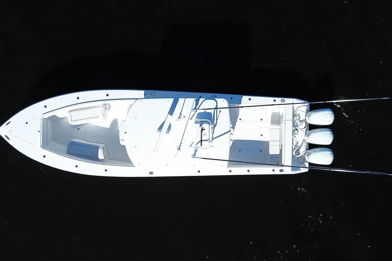Slide: The Image of Overhead view of 2018 Jupiter 38 FS boat with triple outboard engines. - 8