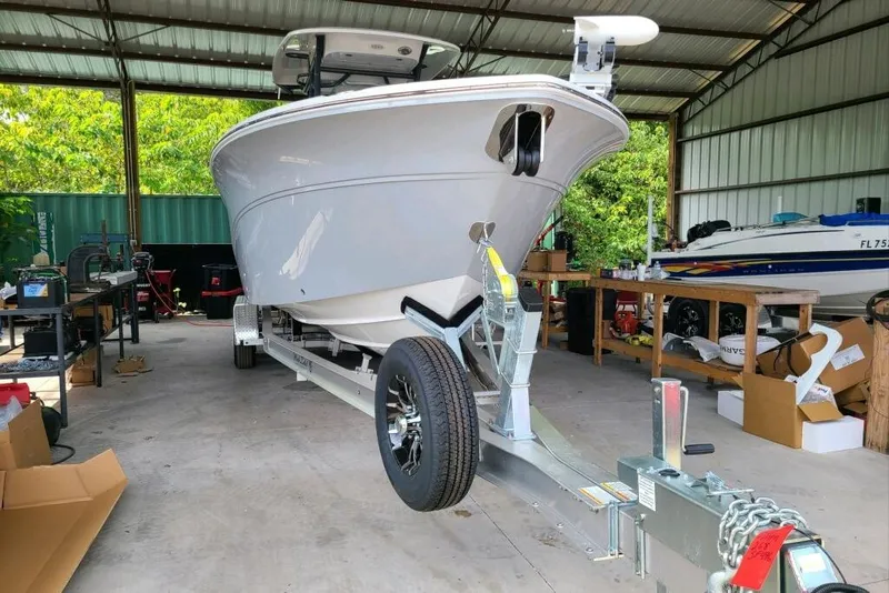 Slide: The Image of 2023 Sea Fox 268 Commander boat on trailer in a covered storage area. - 6