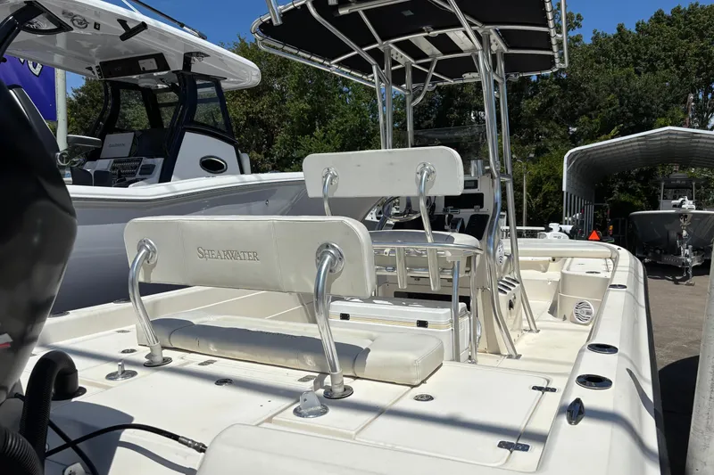 Slide: The Image of 2006 Shearwater Boatworks 2400Z, white interior, dual seating, outdoor display. - 3