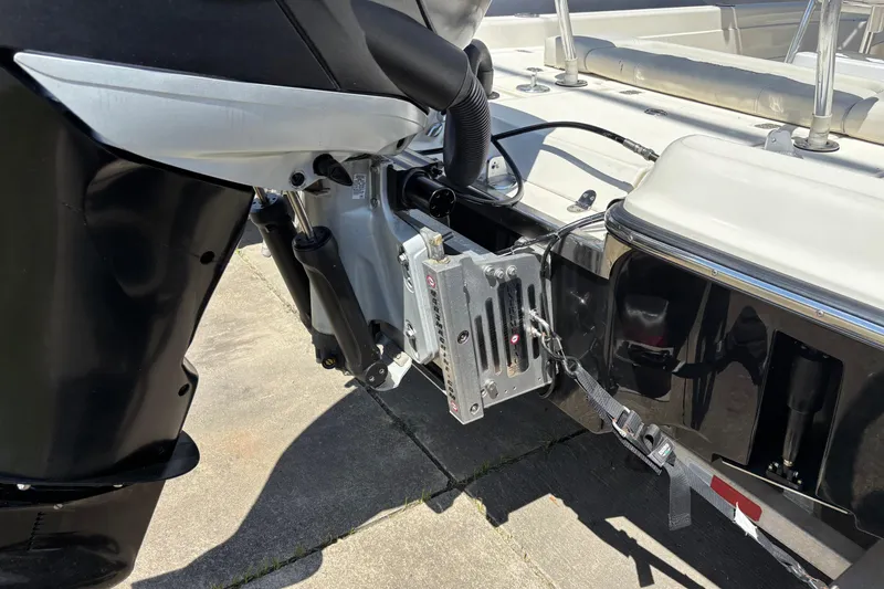 Slide: The Image of 2006 Shearwater Boatworks 2400Z motor and transom detail, showcasing engine mount and hardware. - 4