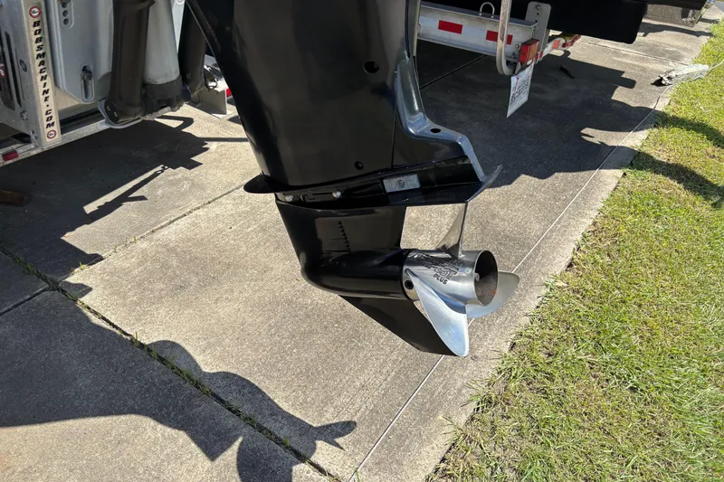 Slide: The Image of Outboard motor propeller of a 2006 Shearwater Boatworks 2400Z on a trailer. - 7