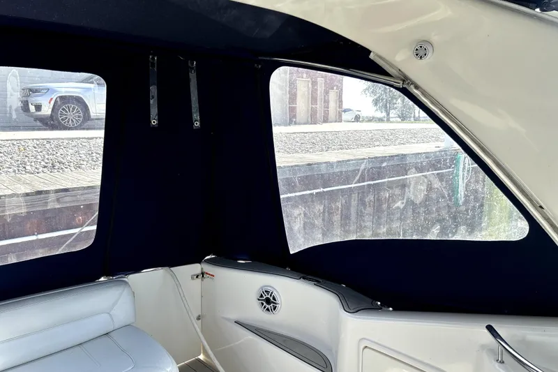 Slide: The Image of Interior view of 2004 Wellcraft 47 Excalibur boat with window and seating. - 10