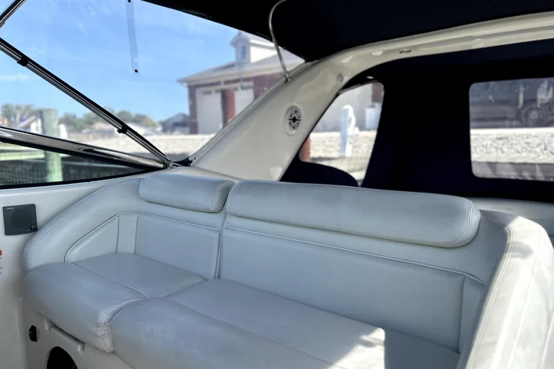 Slide: The Image of Interior of 2004 Wellcraft 47 Excalibur boat with white leather seating. - 13