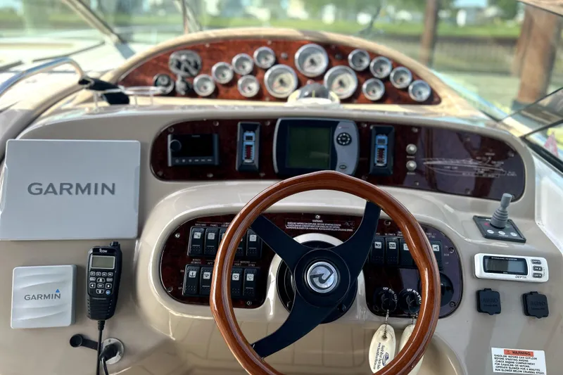Slide: The Image of Dashboard of 2004 Wellcraft 47 Excalibur boat with Garmin navigation system. - 16