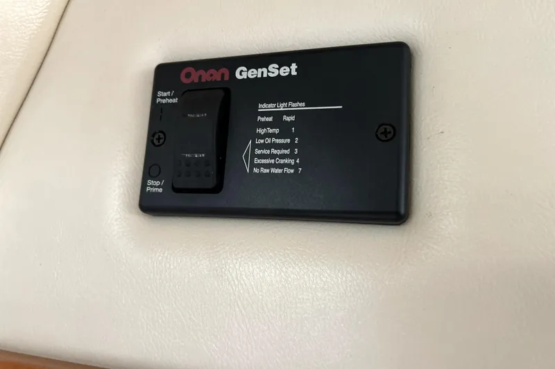 Slide: The Image of Onan GenSet control panel on 2004 Wellcraft 47 Excalibur boat. - 41