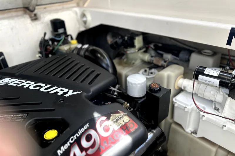 Slide: The Image of Engine compartment of a 2004 Wellcraft 47 Excalibur with Mercury 496 Mag HO engine. - 49