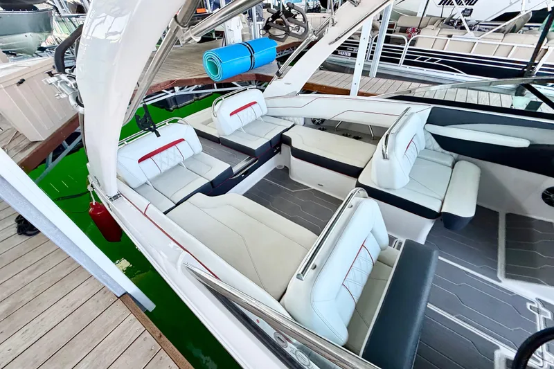 Slide: The Image of 2020 Regal LS4 Surf boat interior with white seating and modern design. - 2