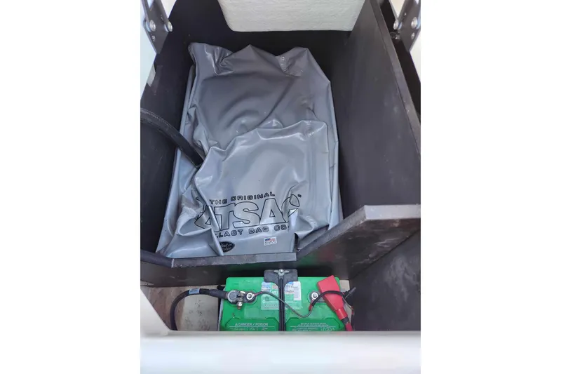 Slide: The Image of 2020 Regal LS4 Surf ballast bag and battery compartment. - 25