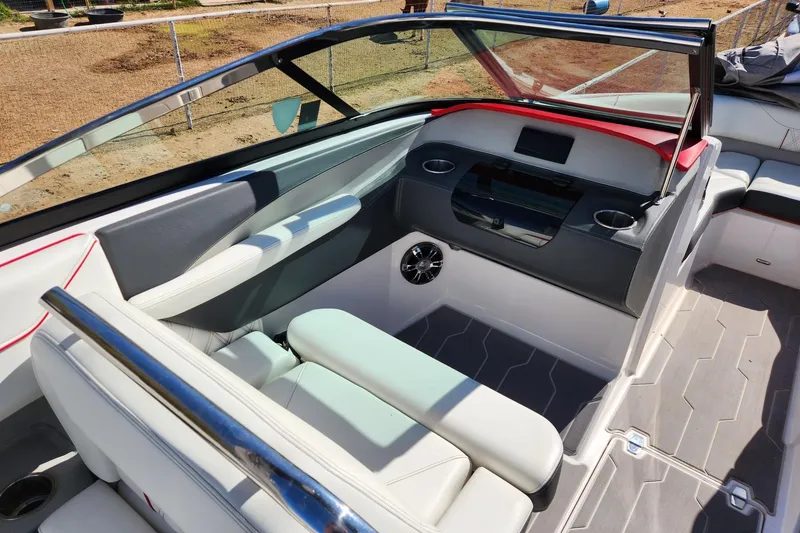 Slide: The Image of 2020 Regal LS4 Surf boat interior with modern seating and dashboard design. - 29