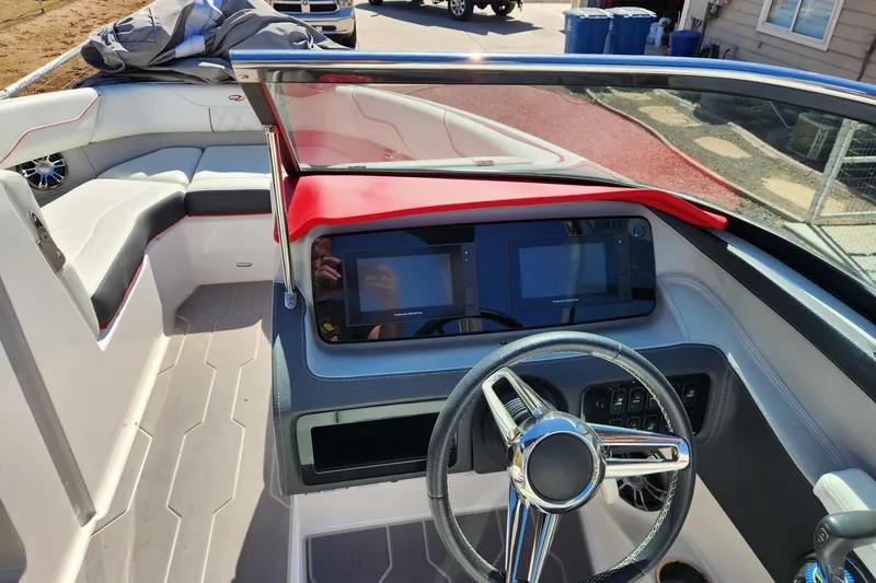 Slide: The Image of 2020 Regal LS4 Surf boat interior with modern dashboard and steering wheel. - 33