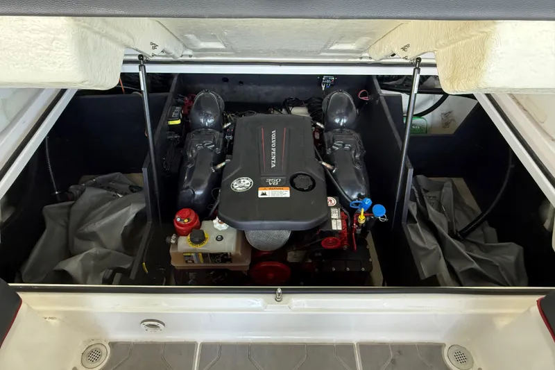 Slide: The Image of 2020 Regal LS4 Surf boat engine compartment with Volvo Penta engine. - 34