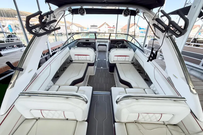 Slide: The Image of 2020 Regal LS4 Surf boat interior with luxurious white seating and modern design. - 5