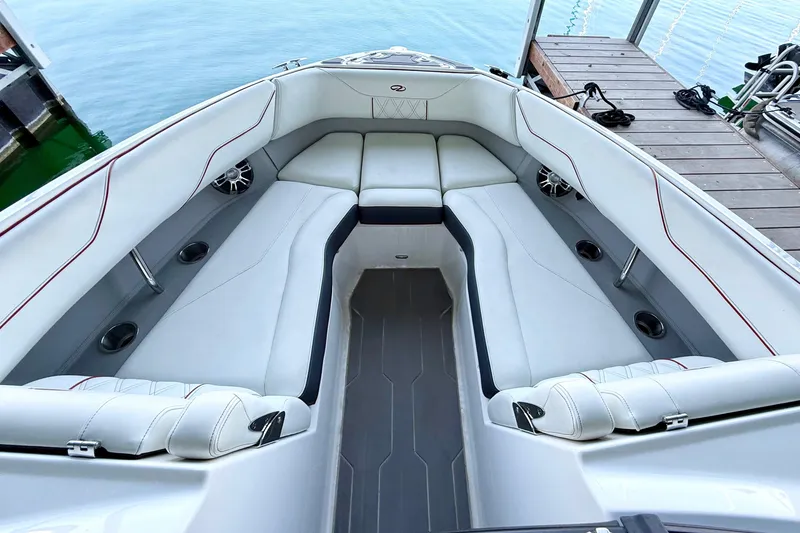Slide: The Image of 2020 Regal LS4 Surf boat interior with white seating and modern design. - 9