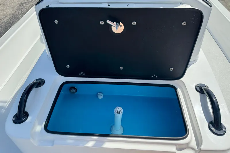Slide: The Image of 2026 SCB R24 boat livewell with open lid and blue interior. - 21