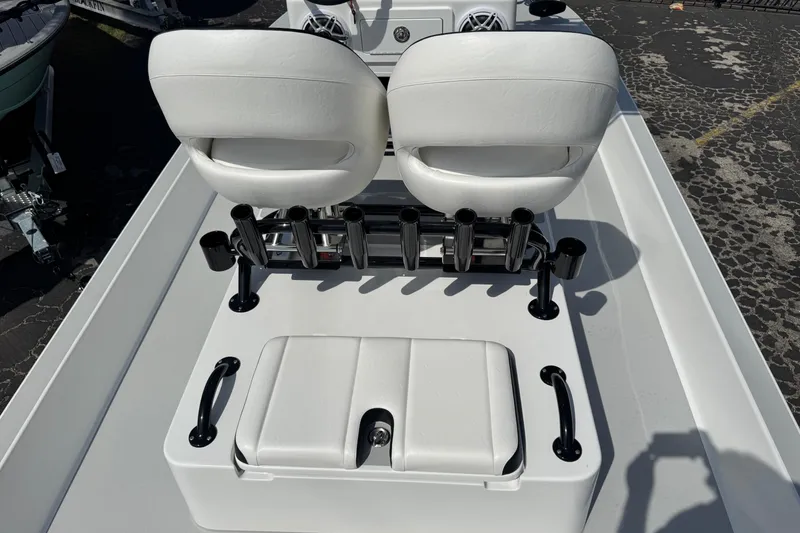 Slide: The Image of 2026 SCB R24 boat interior with white seats and rod holders. - 22