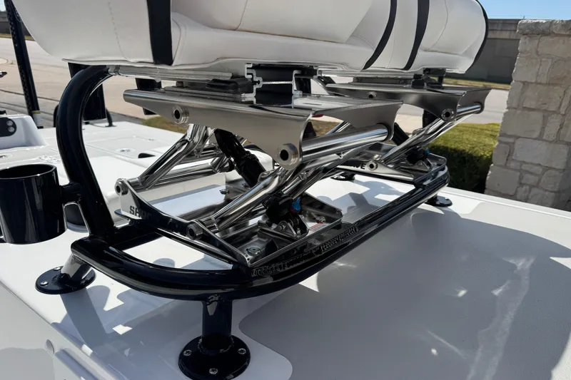 Slide: The Image of 2026 SCB R24 boat seat with stainless steel frame and white cushions. - 26