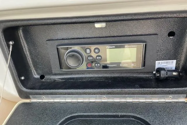 Slide: The Image of 2008 Chris-Craft Launch 28 boat stereo system with Fusion marine audio controls. - 26