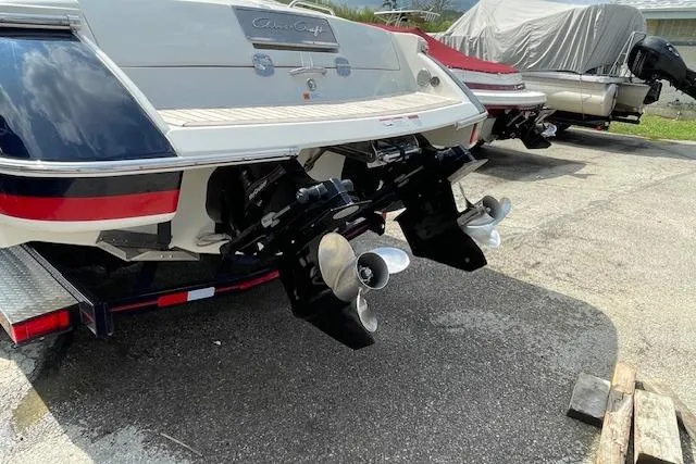 Slide: The Image of 2008 Chris-Craft Launch 28 boat with dual propellers on a trailer. - 5